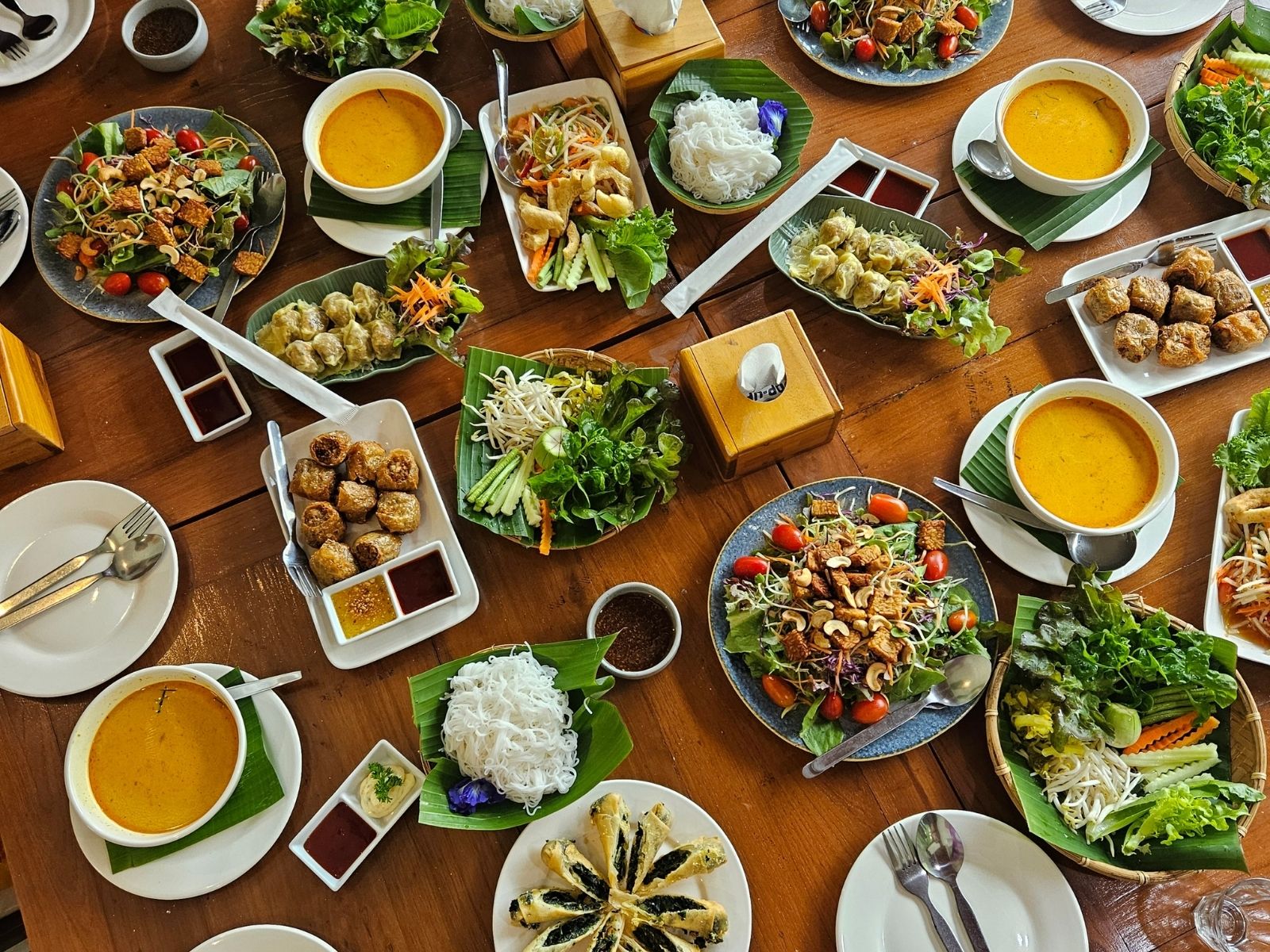 Itinerary Thailand Vegetarian Festival Traditional Thai vegan feast served family-style