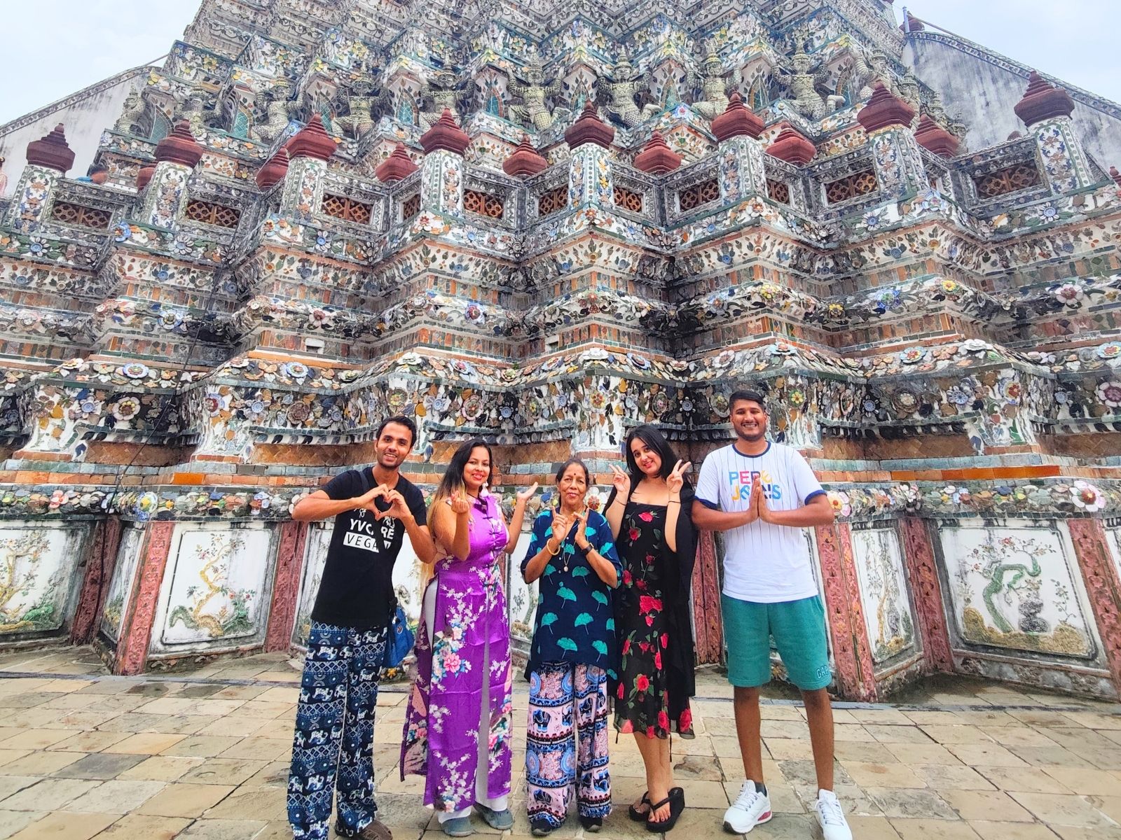 Itinerary Thailand Vegetarian Festival Travellers exploring the Wat Arun in Bangkok, Thailand