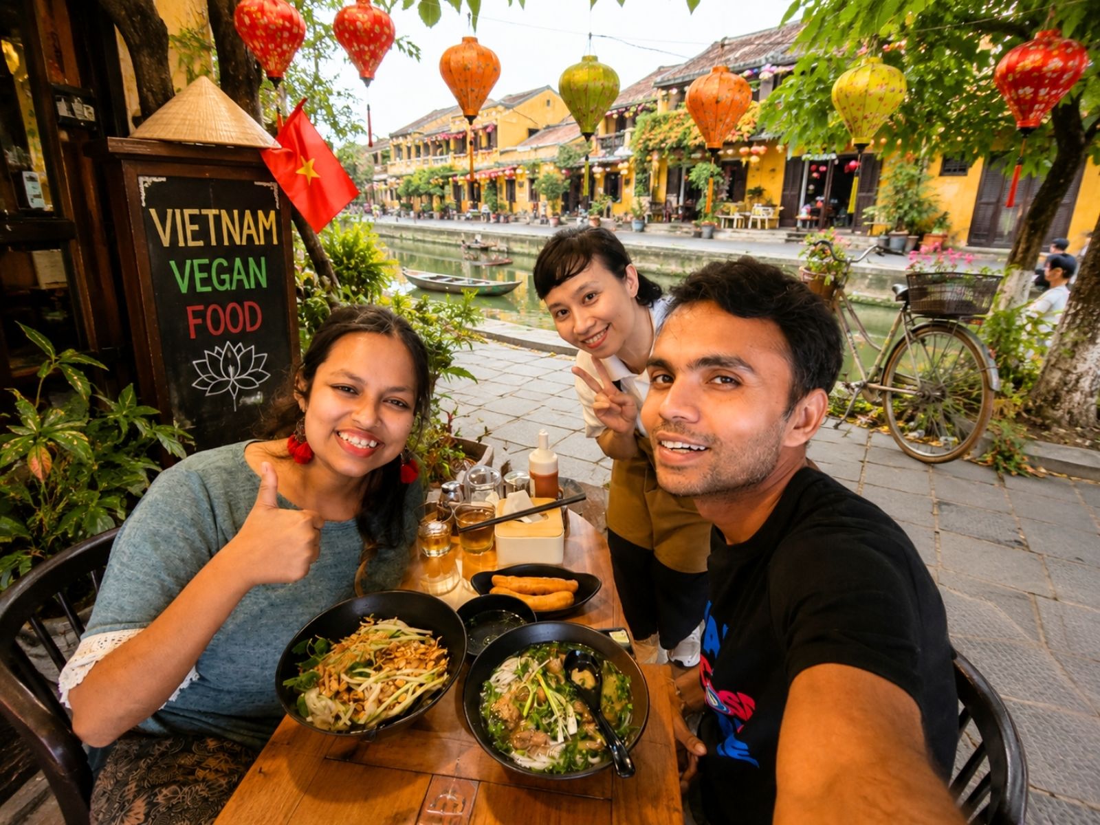 Couple enjoying authentic Vietnamese vegan cuisine in Hoi An