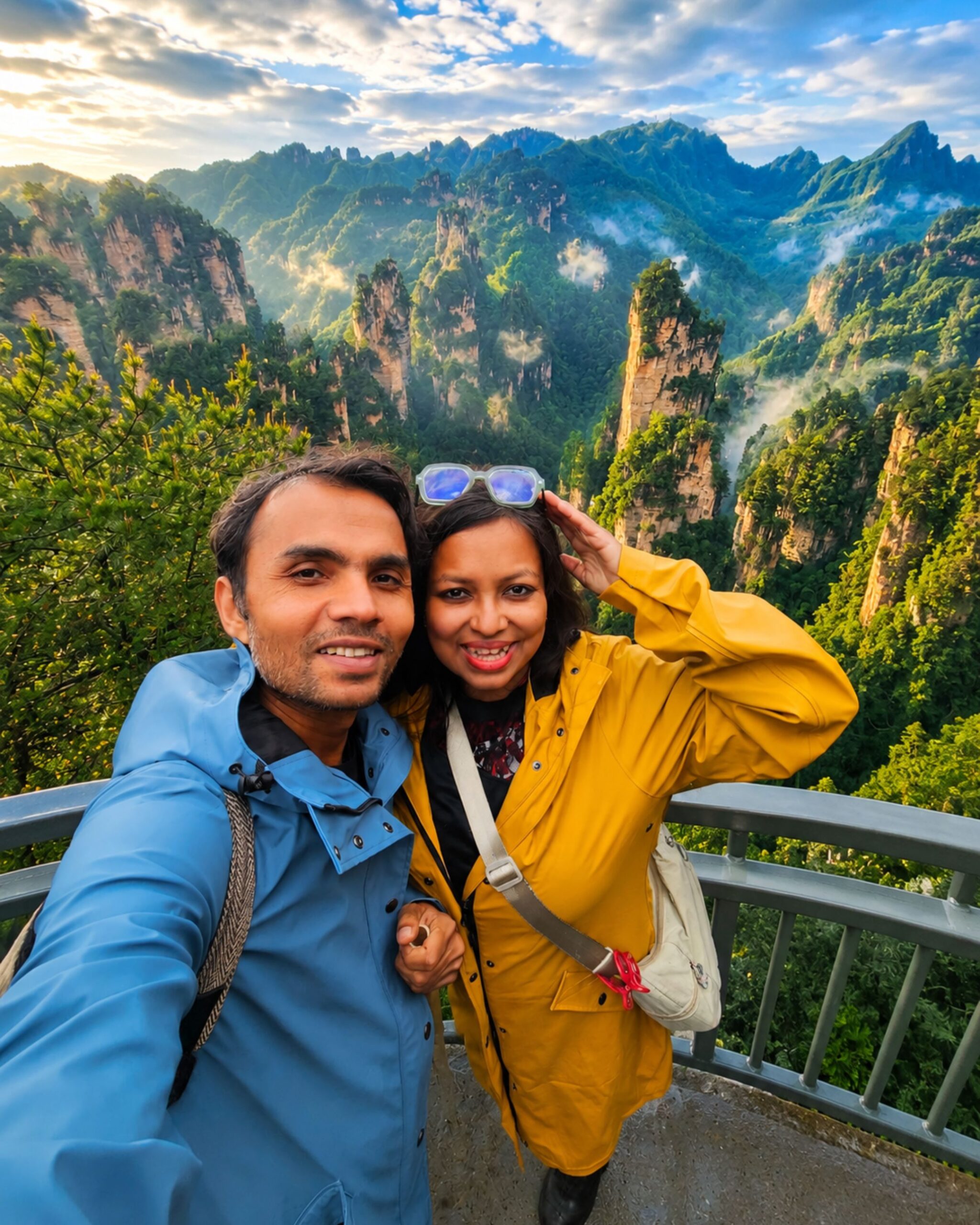 About Us Travellers overlooking the Avatar Mountains in Zhangjiajie, China