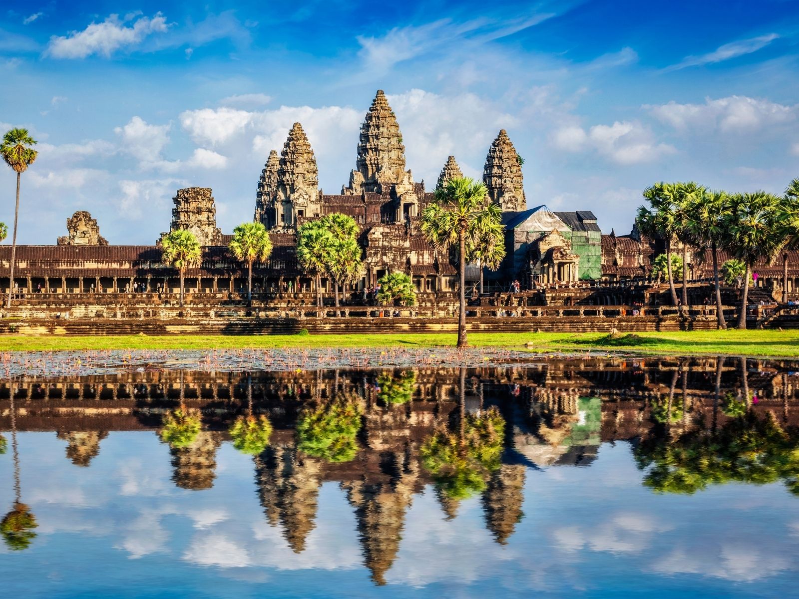 Angkor Wat reflected in the lake at sunrise in Cambodia